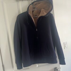 Uniqlo soft hoodie
Kids XXL, or adult M